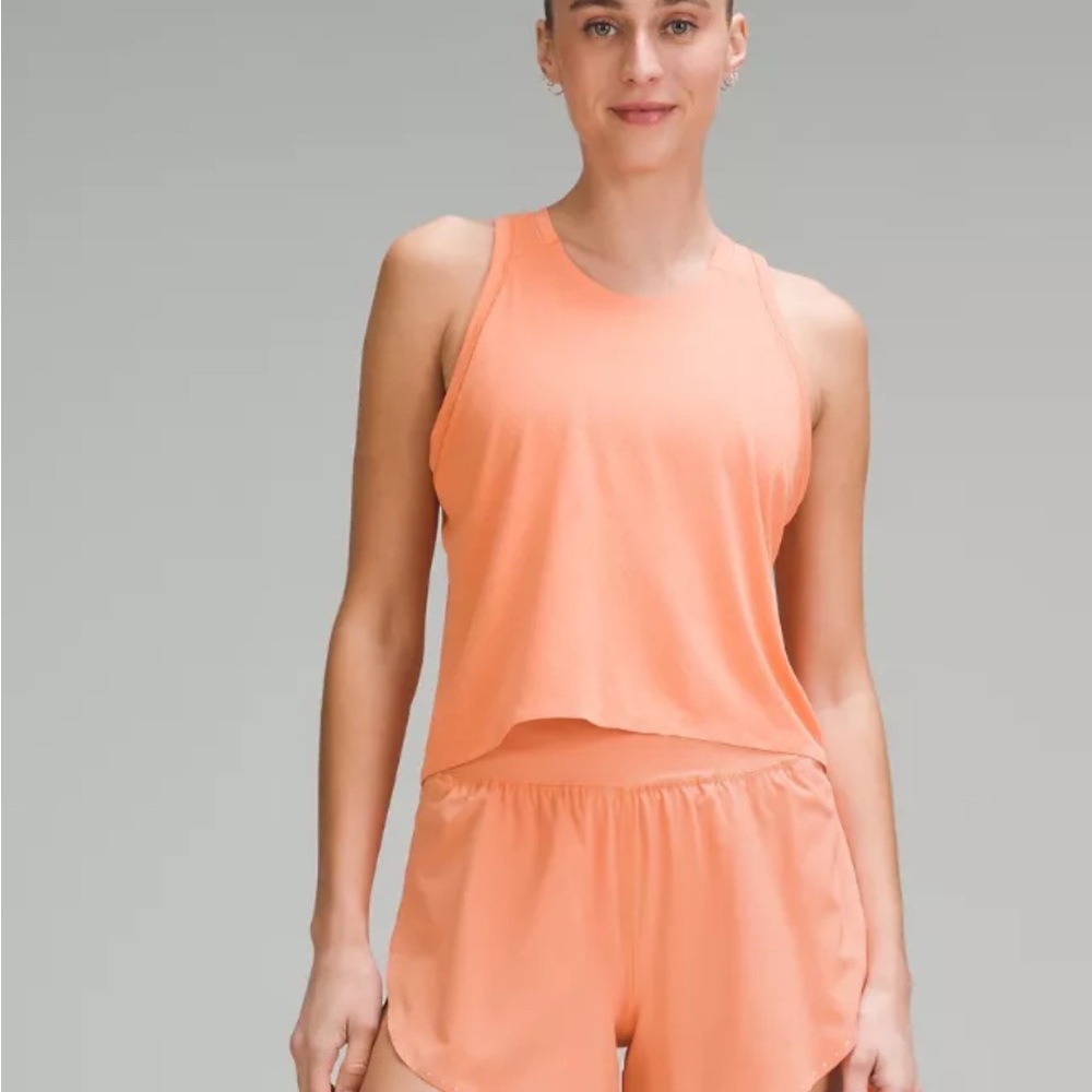Orange Lululemon fast and free waist length tank top